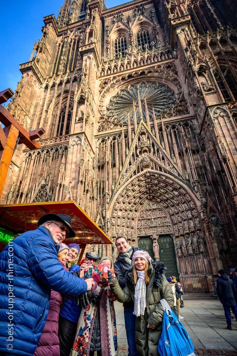 Enjoy a mulled wine in front of the cathedral during Christmas Market in Strasbourg