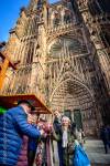 Enjoy a mulled wine in front of the cathedral during Christmas Market in Strasbourg